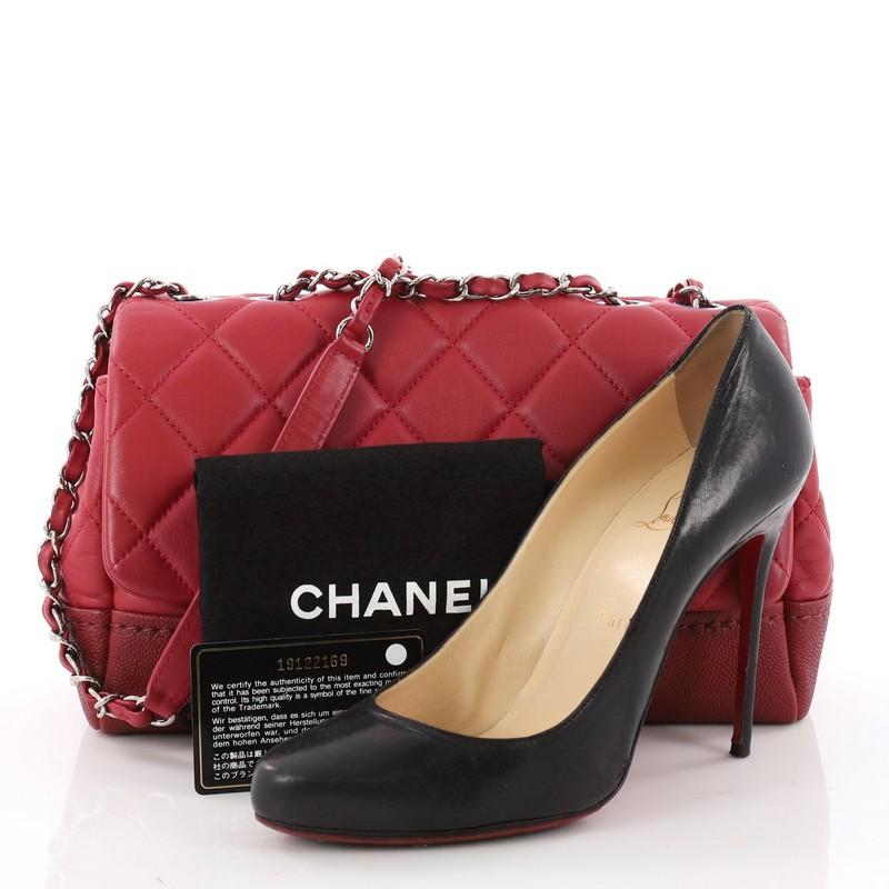 This authentic Chanel Bi Coco Flap Bag Quilted Lambskin with Caviar Medium is a fabulous day or evening bag with the special touch of quality. Crafted in red quilted lambskin and caviar leather, this flap bag features woven-in leather chain strap