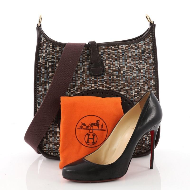 This authentic Hermes Evelyne Crossbody Gen I Vibrato and Barenia PM showcases a simple, day-to-day style perfect for someone's first Hermes bag. Crafted from multicolor Vibrato leather, this crossbody bag features a signature perforated H design at