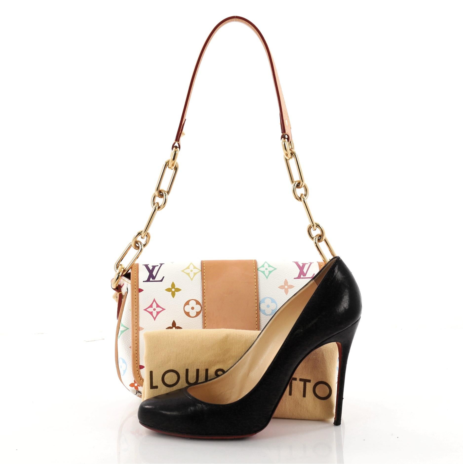 This authentic Louis Vuitton Patti Handbag Monogram Multicolor embodies the spirit of any fashionista who has a touch of rock attitude. Crafted in white monogram multicolor coated canvas, this chic bag features chain link strap with leather shoulder
