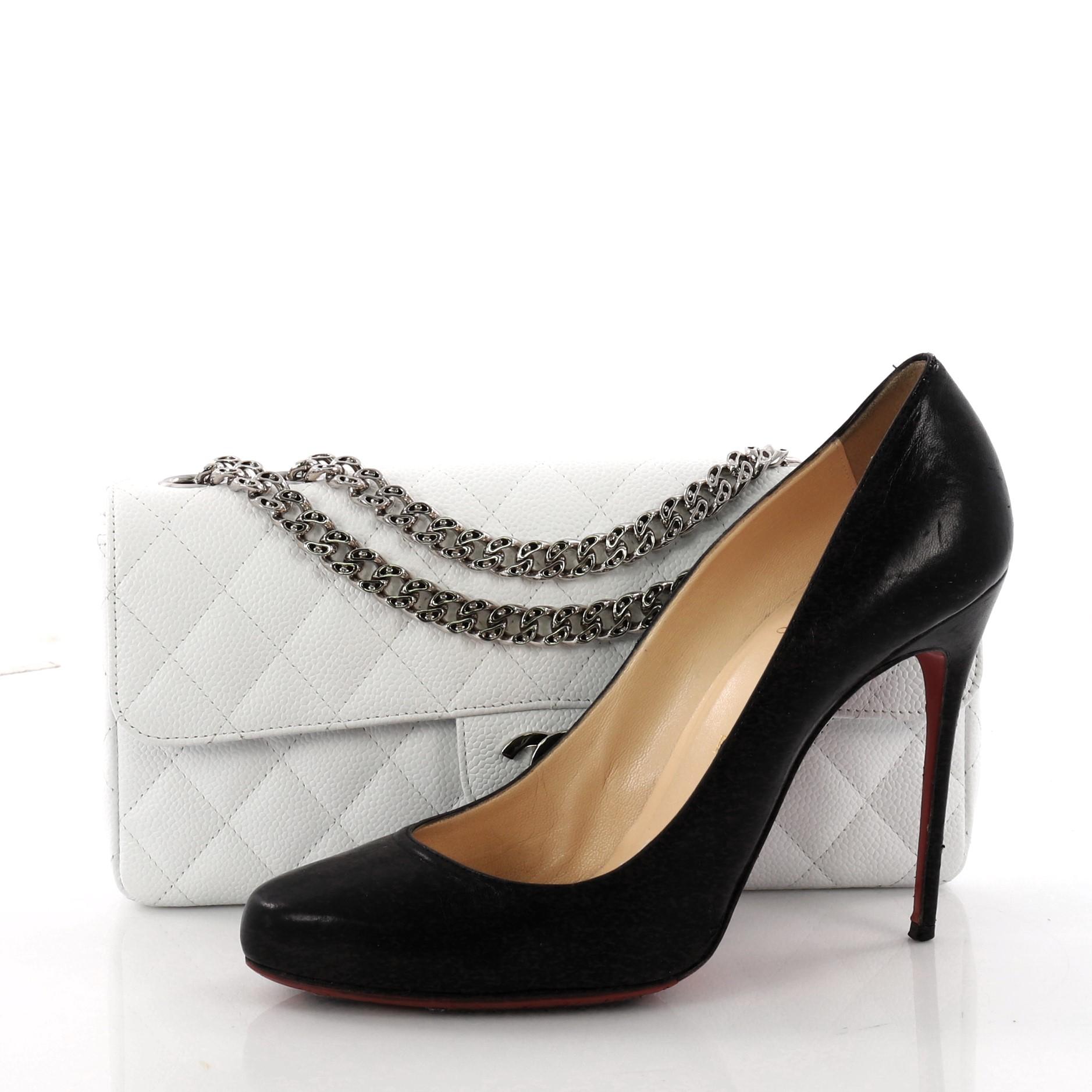 This authentic Chanel Bijoux Chain Flap Bag Quilted Caviar East West is a classic design perfect for transitioning from day-to-evening looks. Crafted from luxurious white caviar leather in signature diamond quilting, this elongated flap bag features