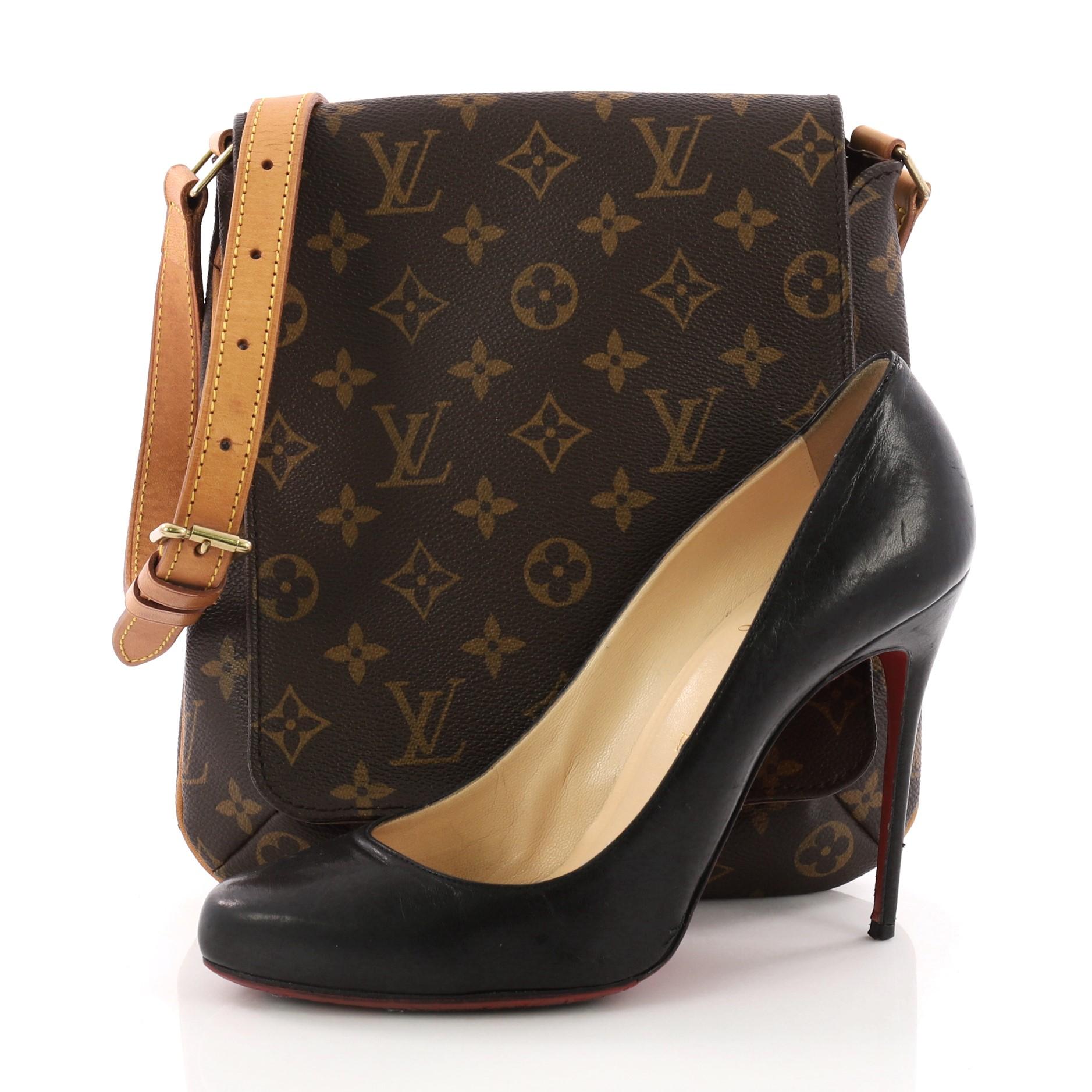 This authentic Louis Vuitton Musette Salsa Handbag Monogram Canvas PM is minimalist and functional shoulder bag perfect for the modern woman. Crafted from classic brown monogram coated canvas, this bag features adjustable cowhide leather strap, full