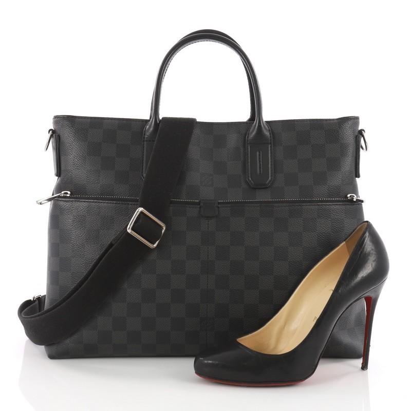 This authentic Louis Vuitton 7 Days A Week Handbag Damier Graphite is an ideal briefcase for everyday use. Crafted in damier graphite leather, this versatile bag features dual-rolled leather handles, two exterior zip pockets and silver-tone hardware
