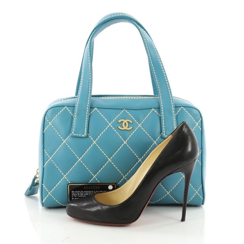 This authentic Chanel Surpique Zip Around Satchel Quilted Leather Medium is the ideal bag for any chic and sophisticated fashionista. Constructed in blue quilted leather with contrast surpique stitching, this classic and functional satchel features