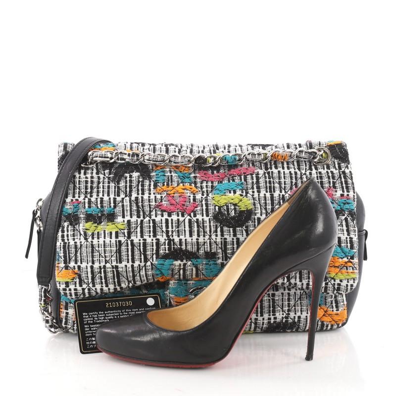 This authentic Chanel Easy Fantasy Flap Bag Quilted Multicolor Tweed Medium is playful and modern in design perfect for Chanel lovers. Crafted in multicolor quilted tweed, this flap bag features woven-in tweed chain strap with leather shoulder pad,