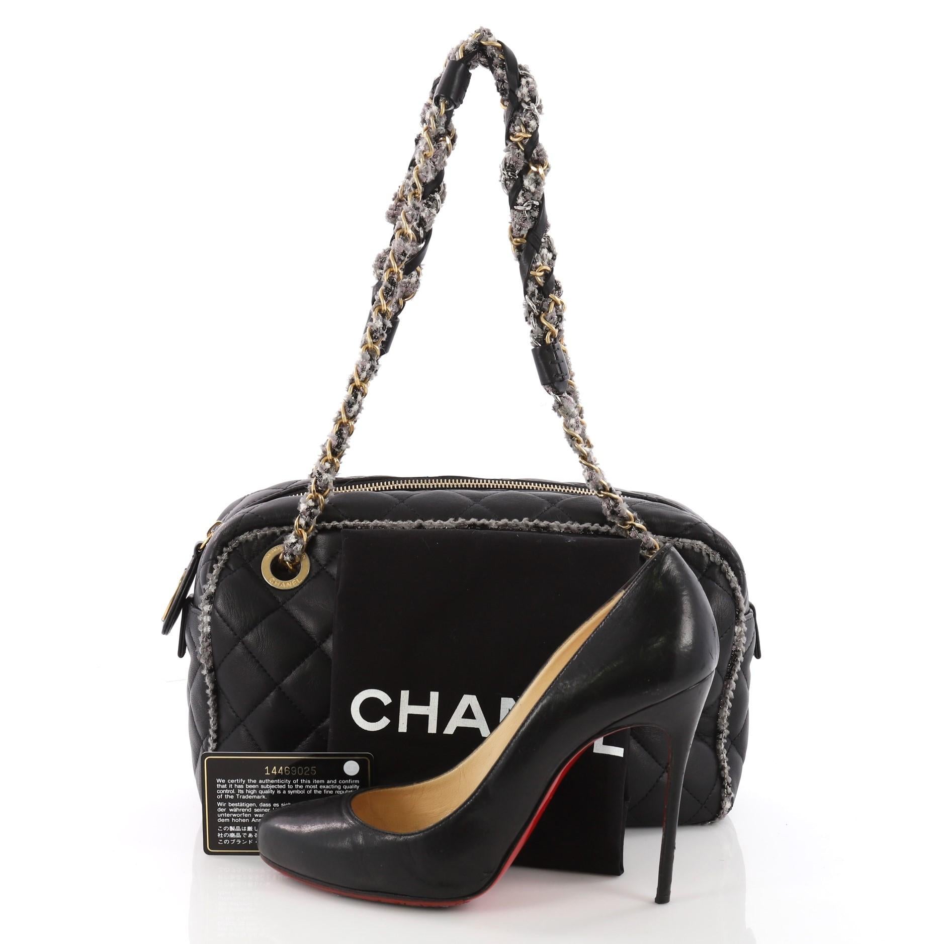 This authentic Chanel Tweed Chain Camera Bag Quilted Lambskin and Tweed Small is a stylish and unique bag. Crafted in black quilted lambskin and tweed, this bag features dual woven-in tweed chain straps, tweed trims, CC logo at front and matte