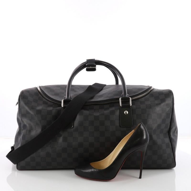 This authentic Louis Vuitton Roadster Handbag Damier Graphite presents a modern luxurious design perfect for weekend trip or light travel. Crafted with damier graphite coated canvas, this luxurious travel-sized bag features dual-rolled leather