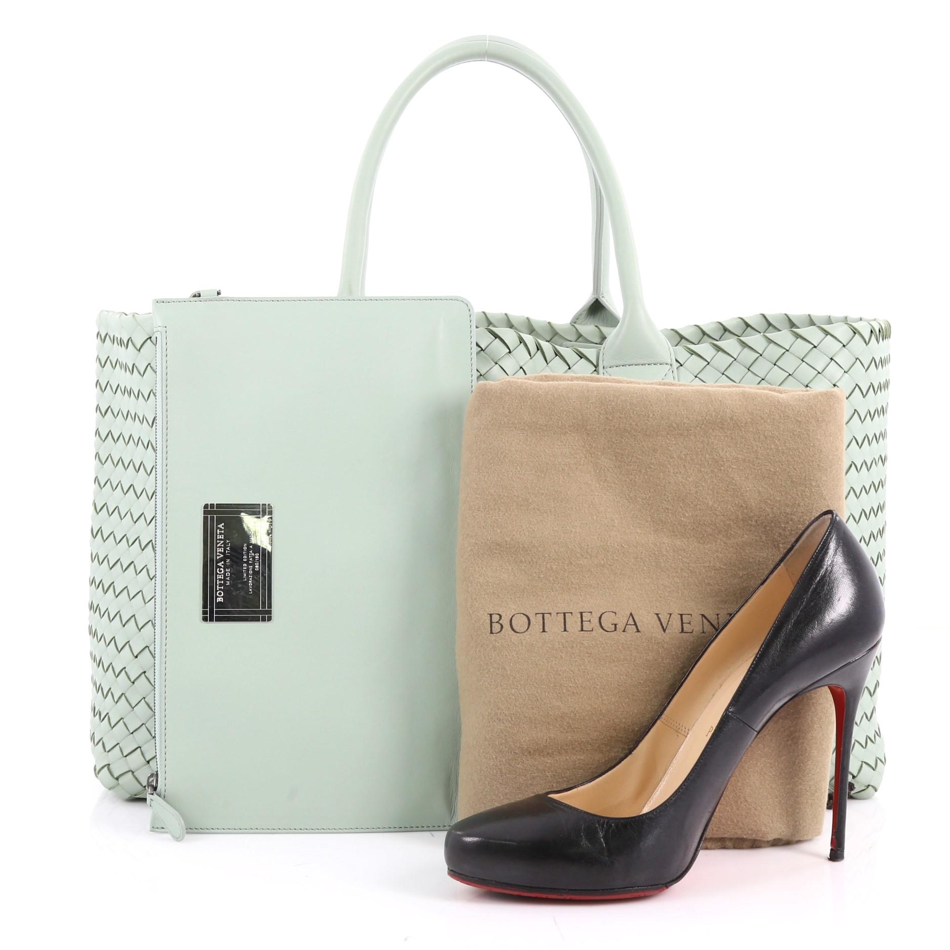 This authentic Bottega Veneta Cabat Tote Intrecciato Nappa Medium is a statement piece you can surely take from day to night. Beautifully crafted in mint green leather in Bottega Veneta's signature intrecciato woven method, this oversized stylish