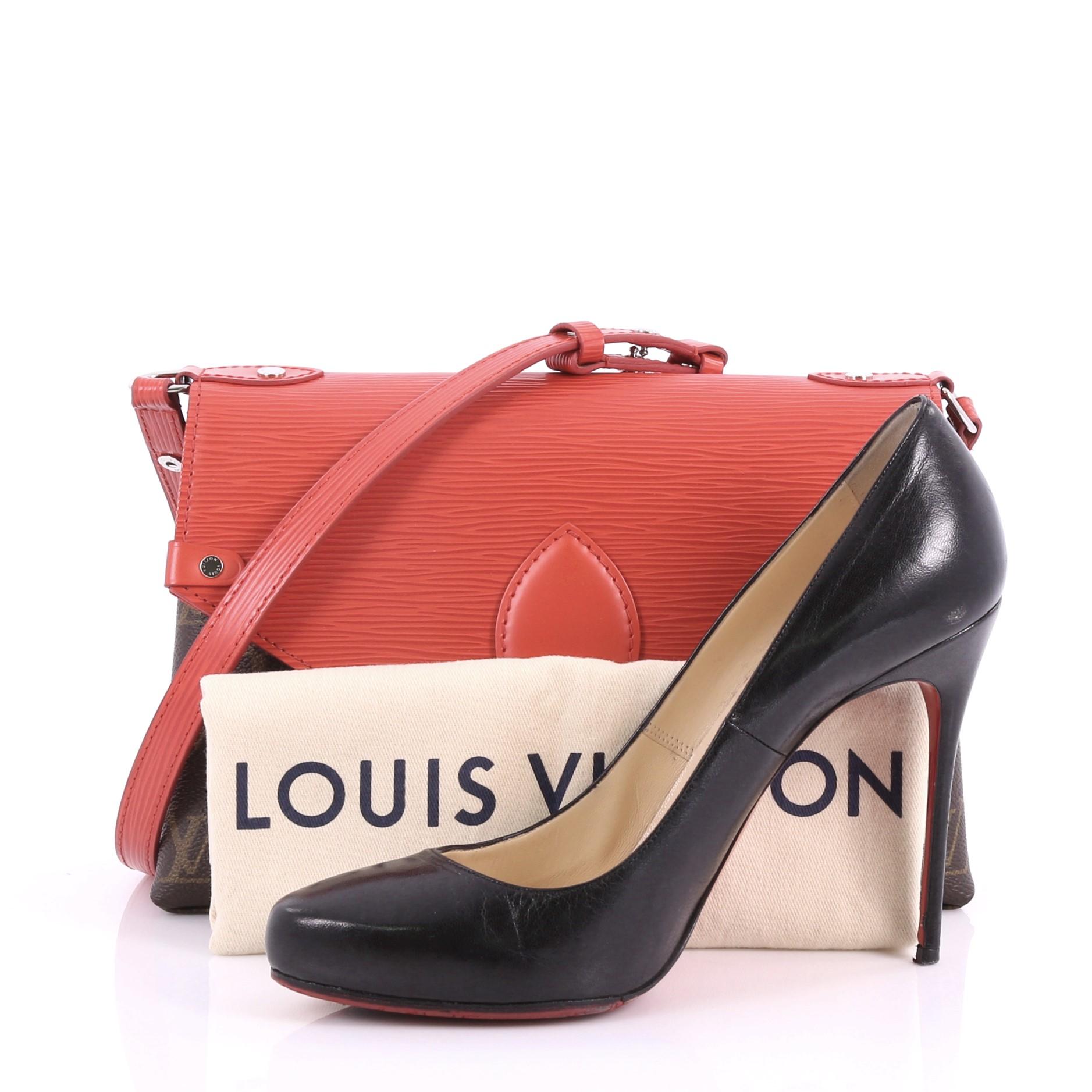 This authentic Louis Vuitton Saint Michel Handbag Monogram Canvas and Epi Leather, crafted in brown monogram coated canvas and red epi leather, features red leather shoulder strap, exterior back pocket and silver-tone hardware. Its magnetic snap