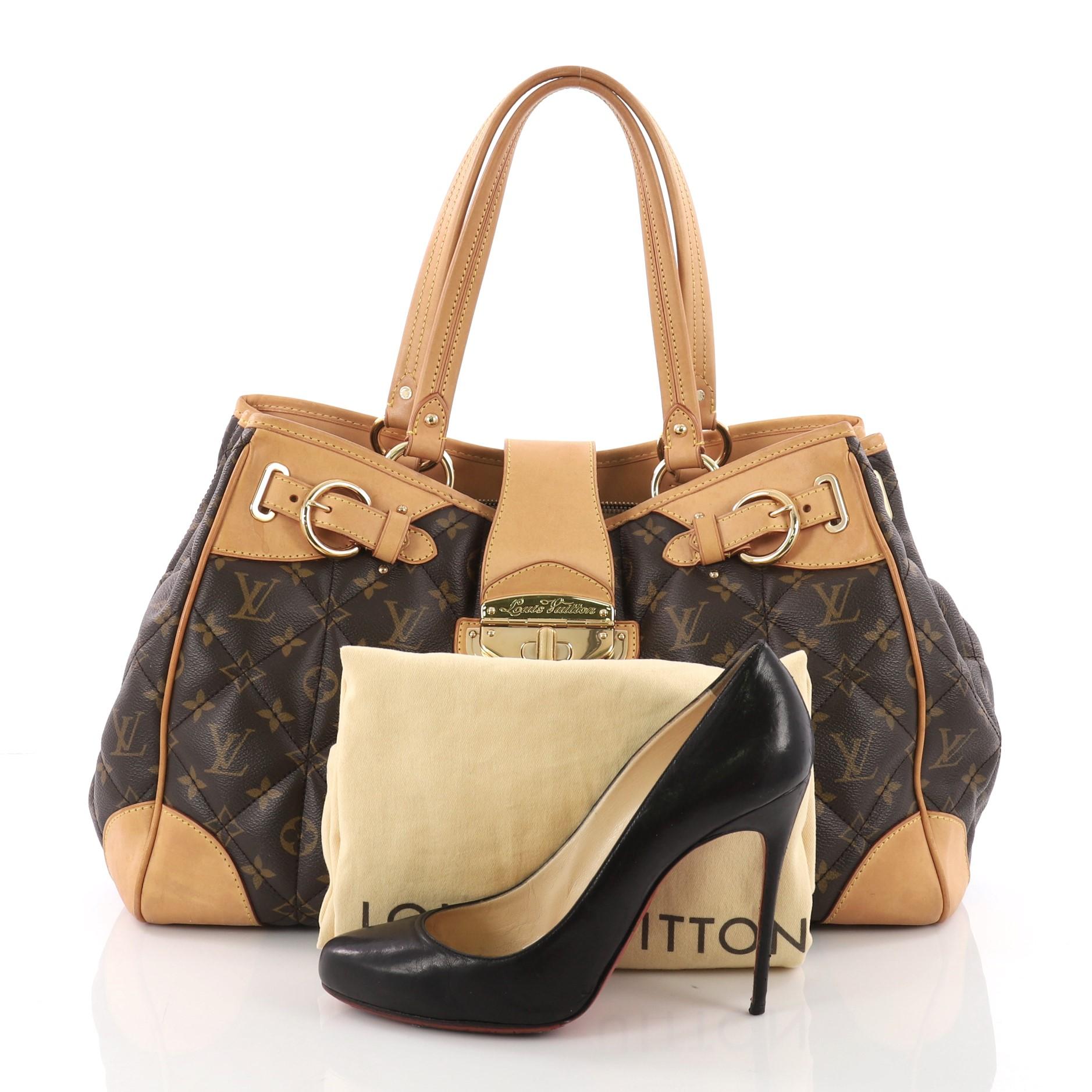This Louis Vuitton Shopper Monogram Etoile, crafted from brown monogram coated canvas, features dual flat leather handles, triple quilting design, and gold-tone hardware accents. Its flap tab and turn-lock closure opens to a beige microfiber