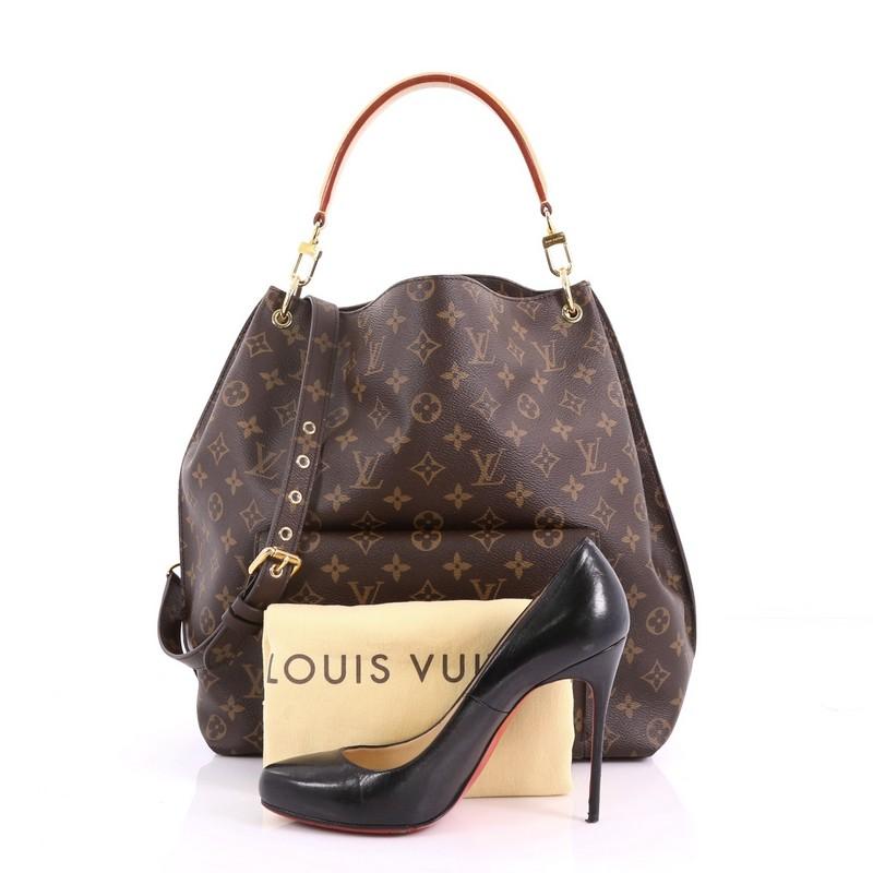 This Louis Vuitton Metis Hobo Monogram Canvas, crafted from brown monogram coated canvas, features a front flap pocket with signature S-lock closure, removable vachetta leather handle, and gold-tone hardware accents. Its wide top opens to a brown