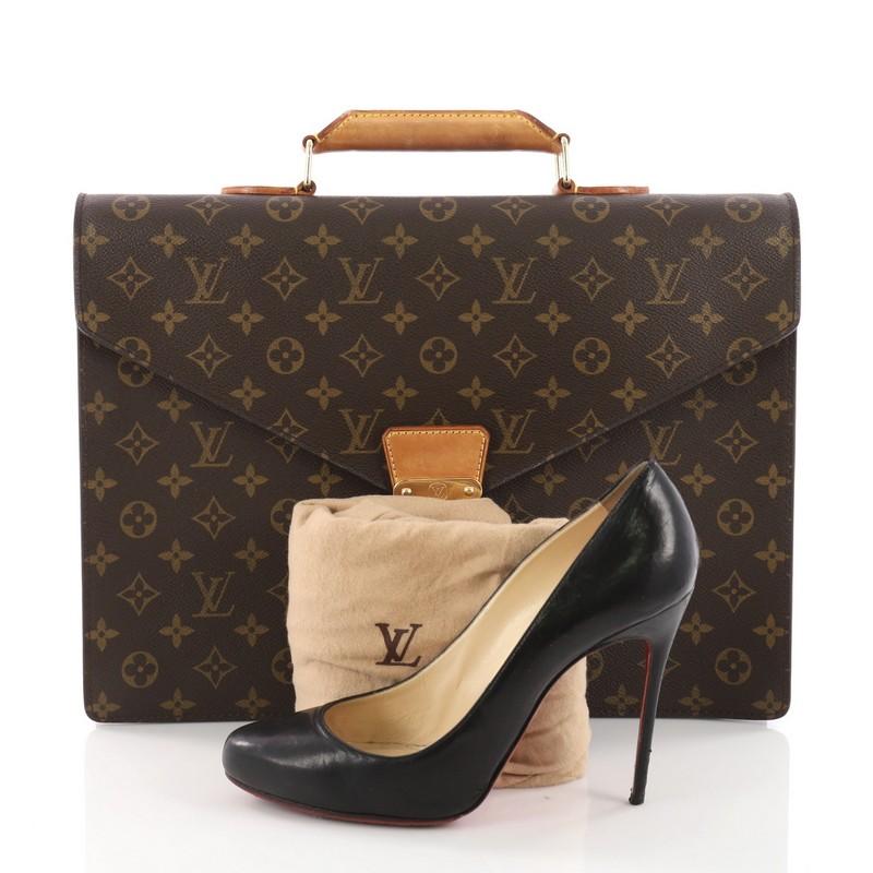 This Louis Vuitton Serviette Conseiller Briefcase Monogram Canvas, crafted from brown monogran coated canvas, features a sturdy leather top handle, frontal v-shaped flap, and gold-tone hardware. Its S-lock closure opens to a brown leather-lined