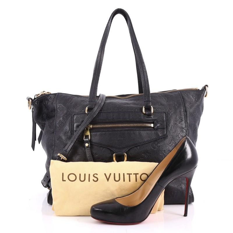 This authentic Louis Vuitton Lumineuse Handbag Monogram Empreinte Leather PM showcases everyday sophistication. Crafted in navy blue monogram empreinte leather, this functional tote features an exterior front zip pocket, dual-flat handles and