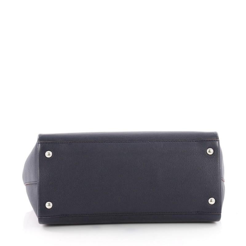 Louis Vuitton Lockmeto Handbag Leather In Good Condition In NY, NY