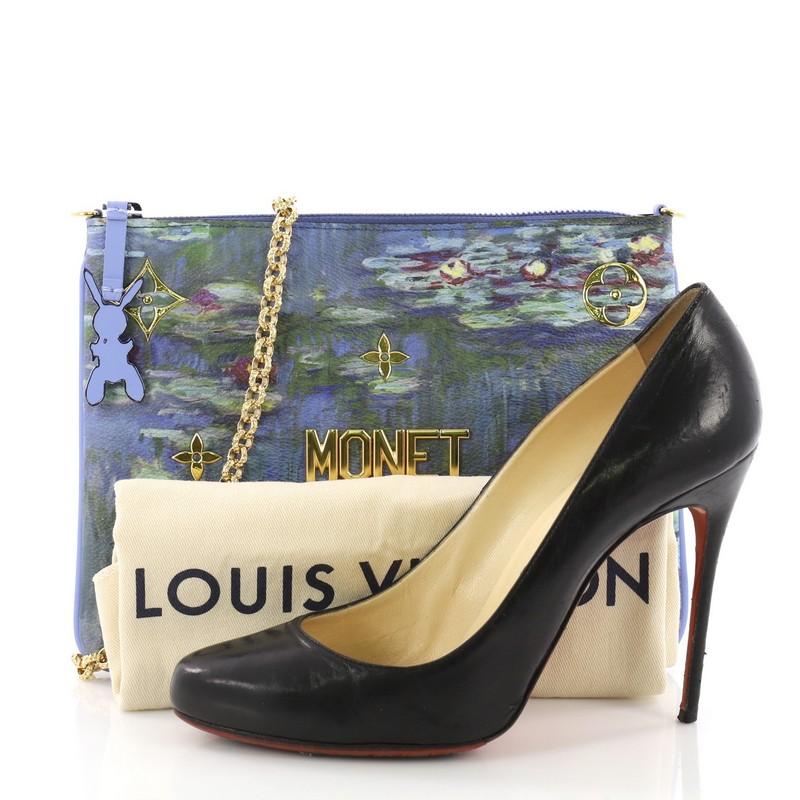 This Louis Vuitton Pochette Clutch Limited Edition Jeff Koons Monet Print Canvas, crafted in blue printed coated canvas, features chain-link strap, reflective metallic letters, and gold-tone hardware. Its zip closure opens to a blue leather interior