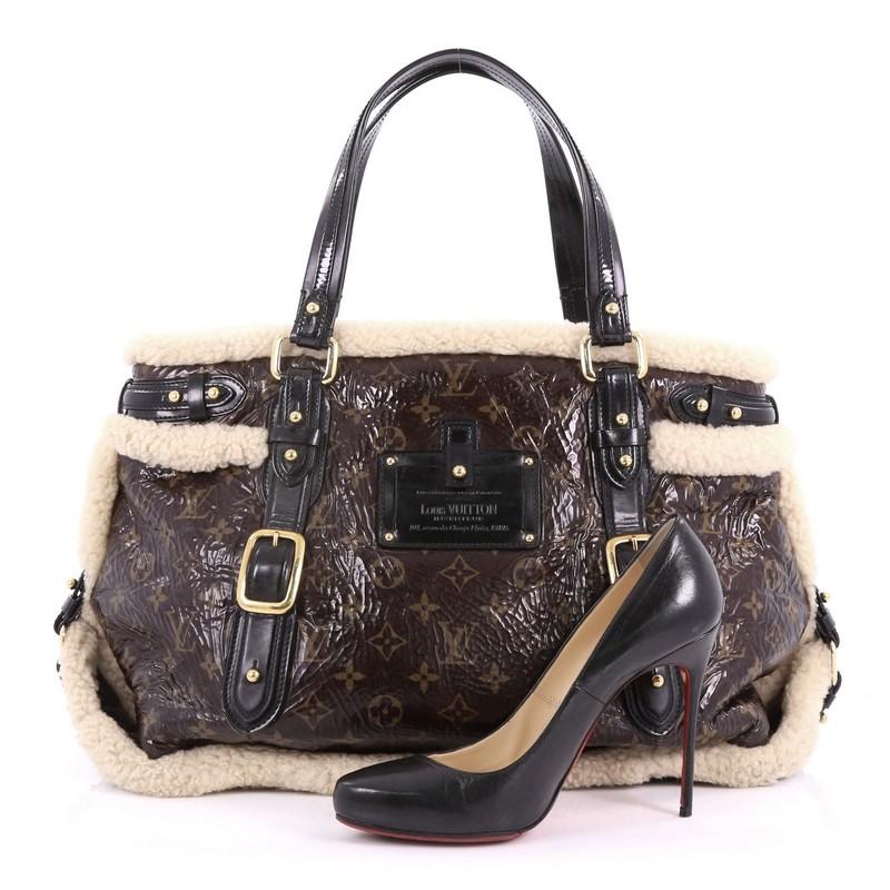 This Louis Vuitton Thunder Handbag Limited Edition Monogram and Shearling, crafted in brown monogram PVC with beige shearling trims, features dual-flat leather handles, Louis Vuitton embossed Inventeur plaque, and gold-tone hardware. Its snap button