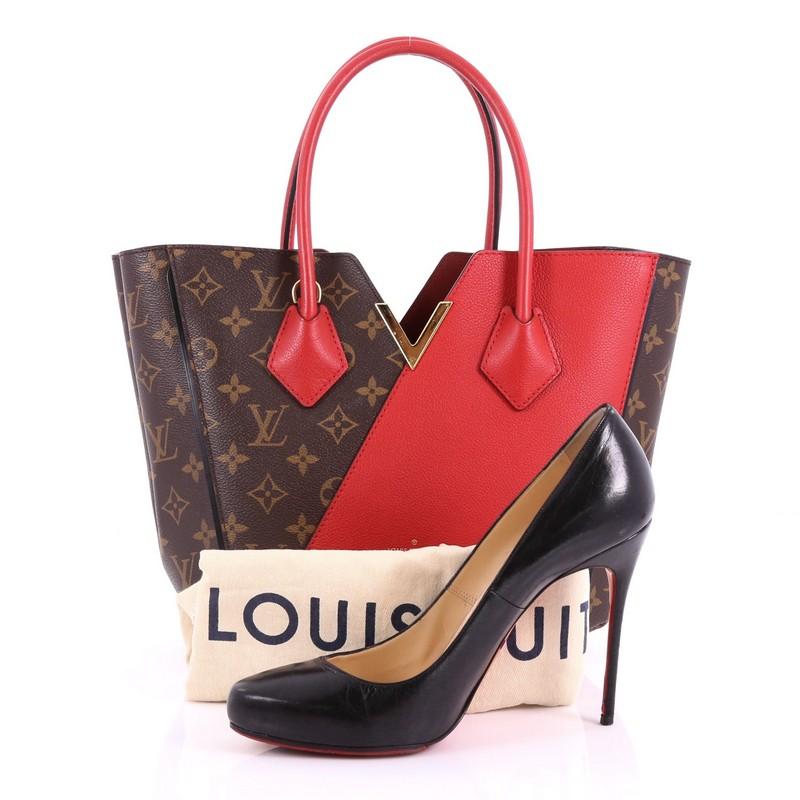 This Louis Vuitton Kimono Handbag Monogram Canvas and Leather PM, crafted from brown monogram coated canvas and red calf leather, features dual rolled toron top handles, a metallic V-cross gold accent, and gold-tone hardware. Its wide top with