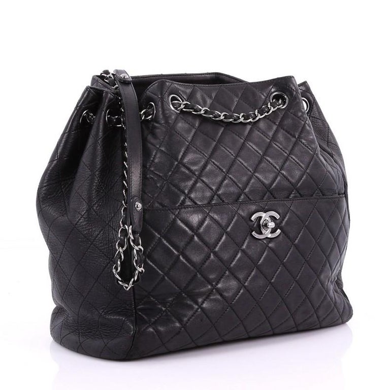 chanel quilted drawstring bag