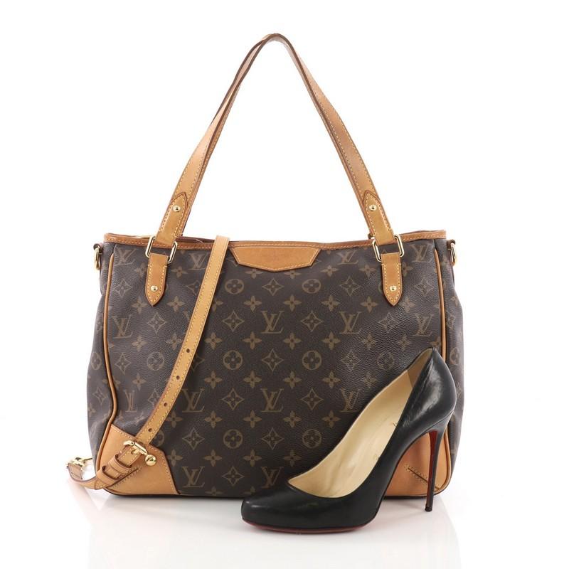 This Louis Vuitton Estrela Handbag Monogram Canvas MM, crafted from brown monogram coated canvas, features dual flat handles, natural cowhide leather trims and gold-tone hardware. Its top zip closure opens to a beige microfiber interior with slip