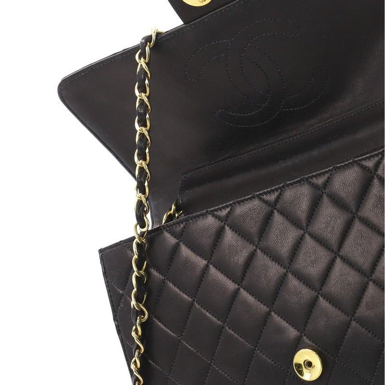 chain handle quilted clutch black