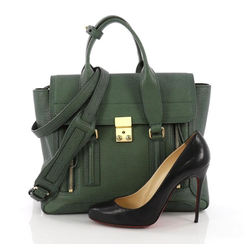 This authentic 3.1 Phillip Lim Pashli Satchel Leather Medium, crafted from green leather, features dual top handles, expandable zip sides, and gold-tone hardware. Its push-lock closure opens to a black fabric interior with side zip pocket. **Note: