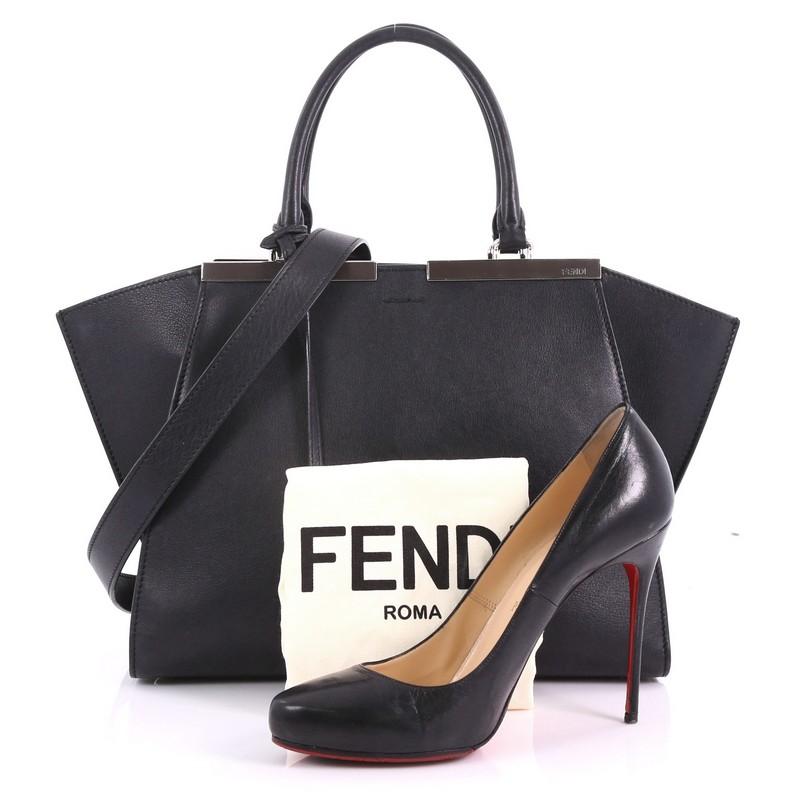 This Fendi Petite 3Jours Handbag Leather, crafted from black leather, features shining split top bar with the Fendi brand name, dual-rolled leather handles, and silver-tone hardware. Its zip closure opens to a black microfiber interior. **Note: Shoe