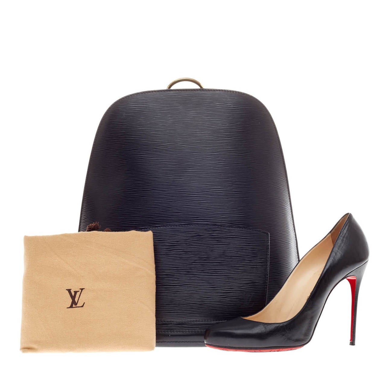 This authentic Louis Vuitton Gobelins Epi Leather Backpack is a stylish and practical bag for work or a walk. Crafted from Louis Vuitton's signature epi leather in black, this bag features brass hardware, smooth leather trimming and adjustable