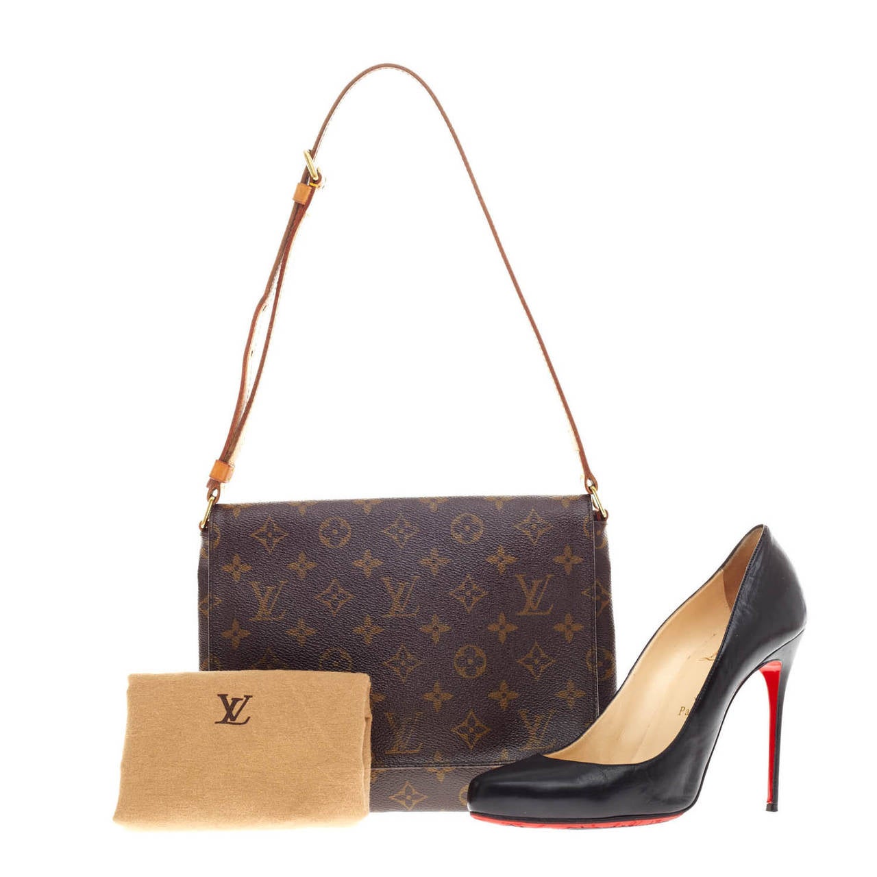 This authentic Louis Vuitton Musette Tango Monogram Canvas Shoulder Bag features the classic Louis Vuitton monogram canvas print on a simple, classic satchel design. This bag features a full flap style, with adjustable cowhide leather strap for