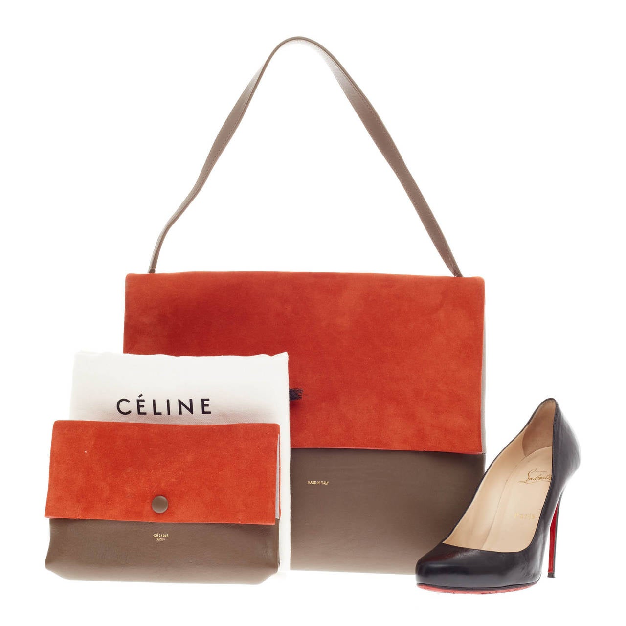 This authentic Celine All Soft Tote in Suede designed in burnt orange, heather gray and brown color block calfskin leather showcases a neutral and understated look perfect for the modern woman. Made of soft suede and smooth leather panels, this