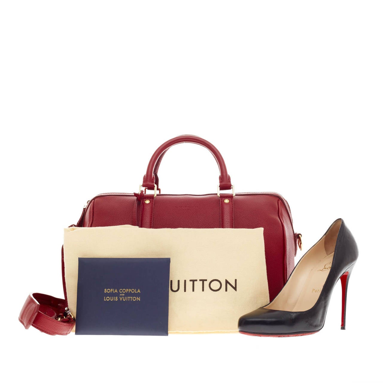 This authentic Louis Vuitton Sofia Coppola SC Bag Veau Cachemire Leather in PM is as stylish and elegant as its designer. Crafted in supple red leather, this simple yet refined duffle bag features sturdy rolled handles and adjustable shoulder strap
