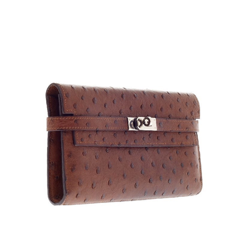At Auction: HERMÈS KELLY WALLET OSTRICH coin purse.