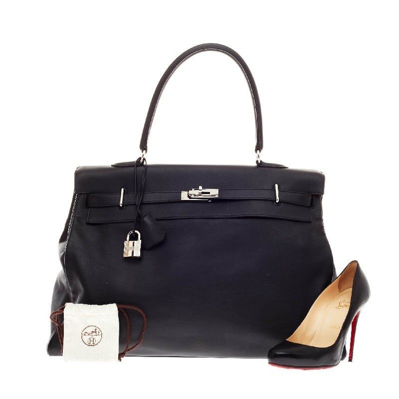 This authentic Hermes Kelly Relax Veau Sikkim 50 showcases a reinterpretation of the classic Kelly design made for sophisticated traveling for any fashionista. Designed from sleek black scratch resistant veau sikkim leather and accented with