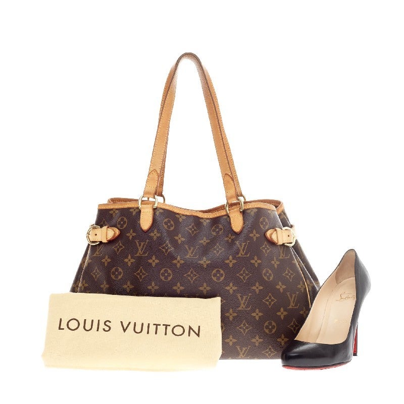 This authentic Louis Vuitton Batignolles Monogram Canvas Horizontal is a classic for casual wear. Crafted in Louis Vuitton's iconic monogram canvas print, this functional tote features vachetta cowhide shoulder straps and trim with gold-tone