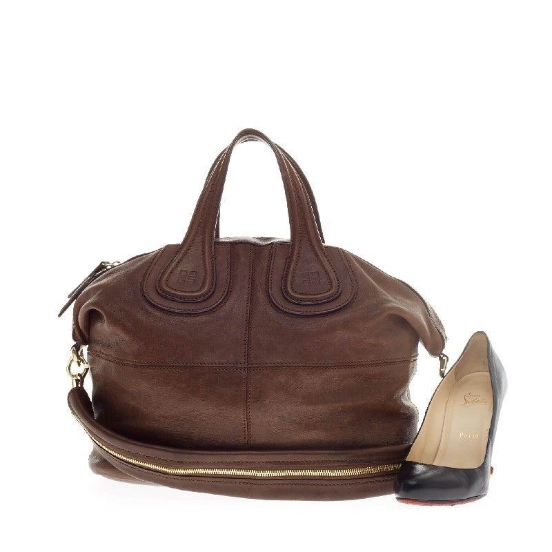 This authentic Givenchy Nightingale Satchel Leather Medium is great for daily use. Crafted in dark brown leather, this bag is defined by its stitched quarters with gold-tone hardware interior and can be worn with its removable strap. Its zipped