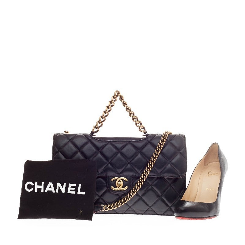 This authentic Chanel Perfect Edge Flap Bag Quilted Leather Medium released in Chanel's Fall 2012-2013 Collection is an eye-catching modern update to the classic flap. Crafted in signature black quilted leather, this new-school flap features a short