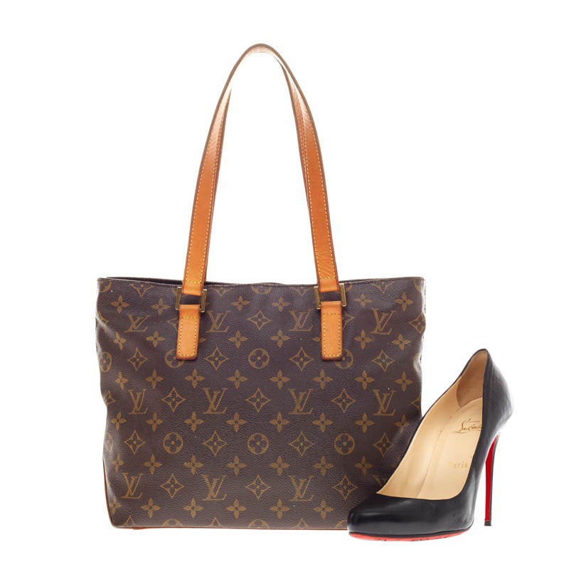 This authentic Louis Vuitton Piano Cabas Monogram Canvas size PM is a practical and minimalistic tote classic to the brand's design. Crafted with Louis Vuitton's iconic monogram canvas, this simple tote features tall cowhide leather handles and side