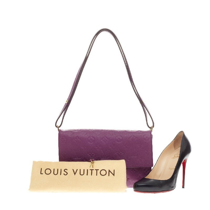 This authentic Louis Vuitton Fascinante Monogram Empreinte Leather is every fashionista’s dream. Crafted in vivid light purple monogram empreinte leather, this versatile flap bag features an adjustable leather strap that allows it to be tucked in