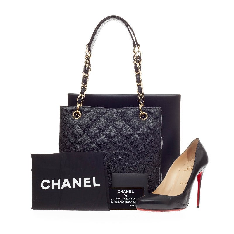 This authentic Chanel Petite Shopping Tote Caviar is made for everyday use. The interlaced double gold chain shoulder straps feature leather padding at the top for comfort and circular gold links. The bag features Chanel's iconic black quilted
