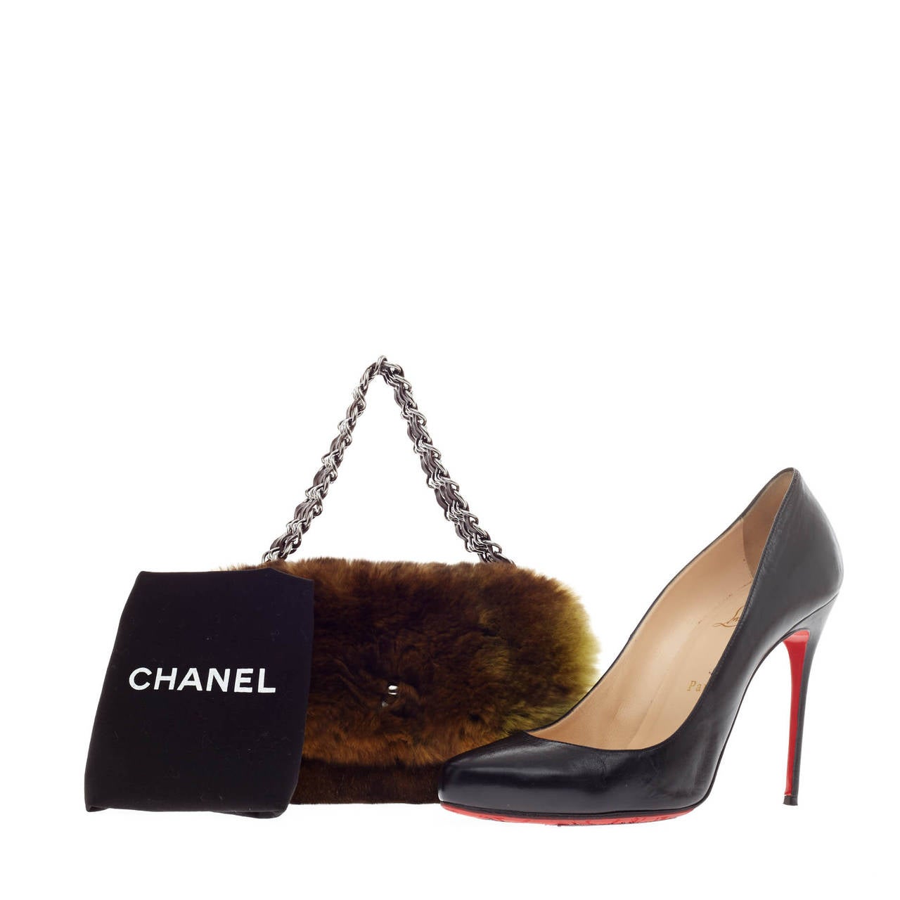 This authentic exotic Chanel Triple Chain Flap Lapin Fur is ideal for nights out and dressy occasions fit for the modern woman. Crafted in genuine shades of brown and green rabbit fur, this stylish and elegant piece features a silver triple chain