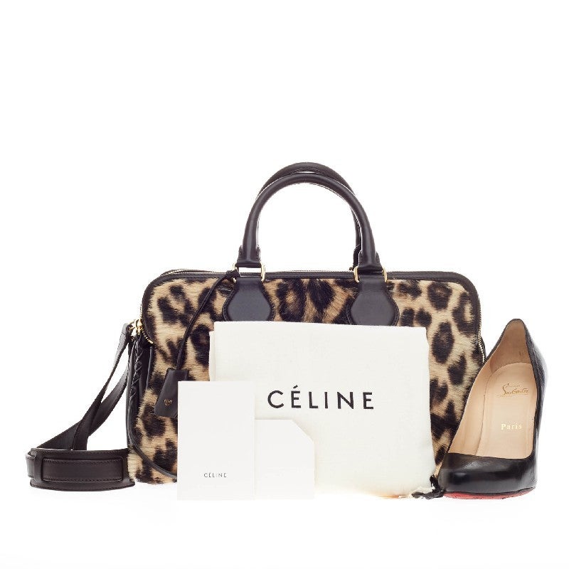 This authentic Celine Triptyque Leopard Print Pony Hair Medium combines everyday functionality with a bold design perfect for everyday use. Crafted in eye-catching soft leopard print pony hair and dark brown leather, this minimalist satchel is