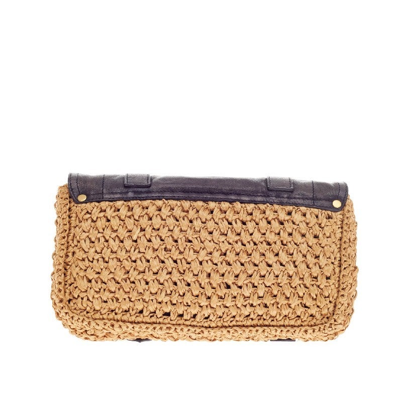 This authentic Proenza Schouler PS1 Pochette Raffia and Leather is your perfect summer night accessory. Crafted from golden beige raffia and navy blue leather, this unique piece features an envelope-style flap front and gold-tone hardware. The gold