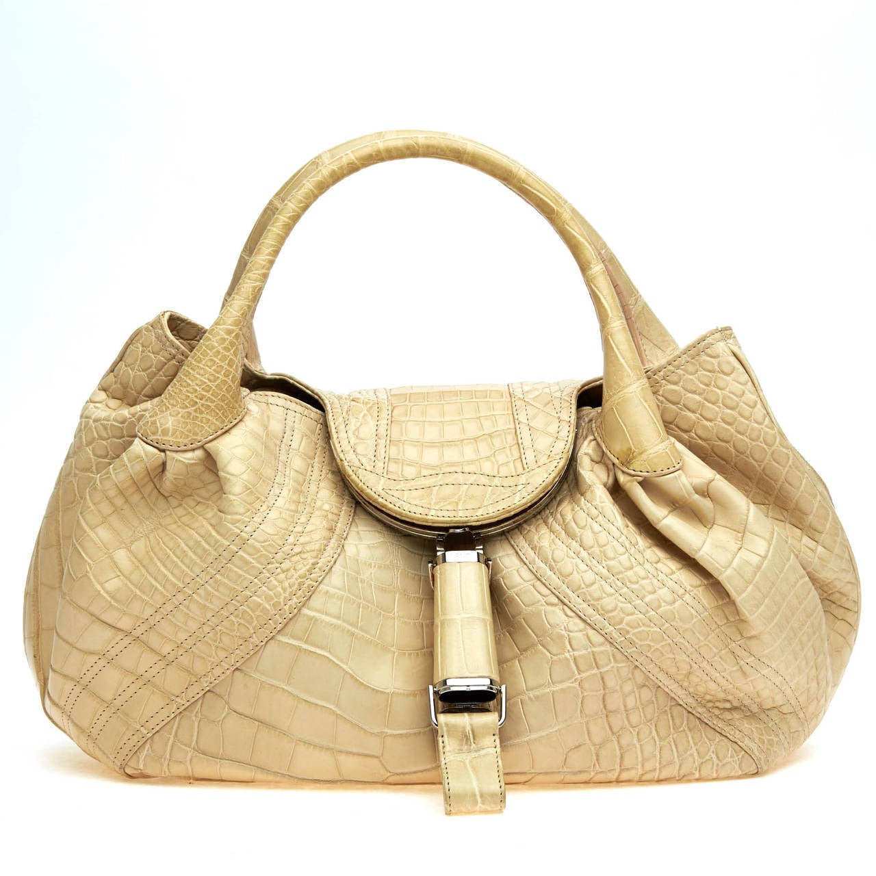This unconventional Alligator Fendi Spy Bag is the ideal purchase for anyone who wants to make a bold statement. This beautifully crafted hobo, in a creme color, features a 