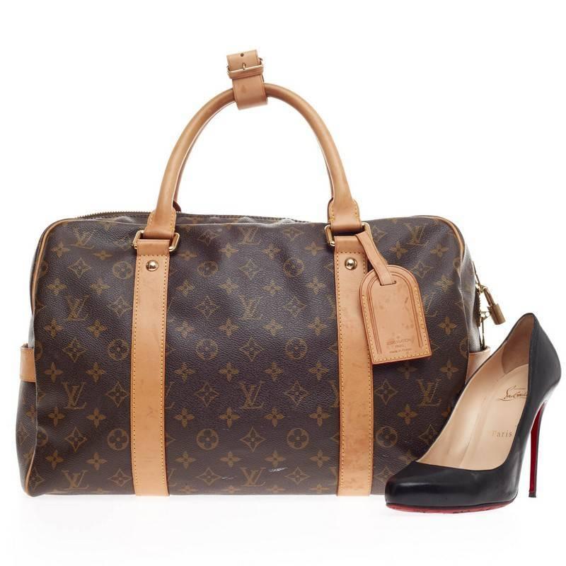 This authentic Louis Vuitton Carryall Monogram Canvas serves a lighter companion to the keepall made for weekend travels. Crafted in LV’s brown monogram canvas, this sporty carry-all features  dual-rolled handles, cowhide vachetta leather trimmings,