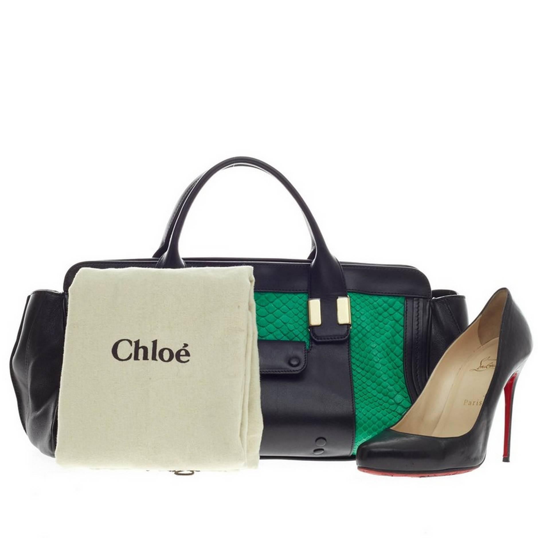 This authentic Chloe Alice Satchel Python Large is an eye-catching piece ideal for day to evening look. Crafted in soft black leather with genuine vivid green and black python skin, this no-fuss, luxurious satchel features dual-rolled handles, front