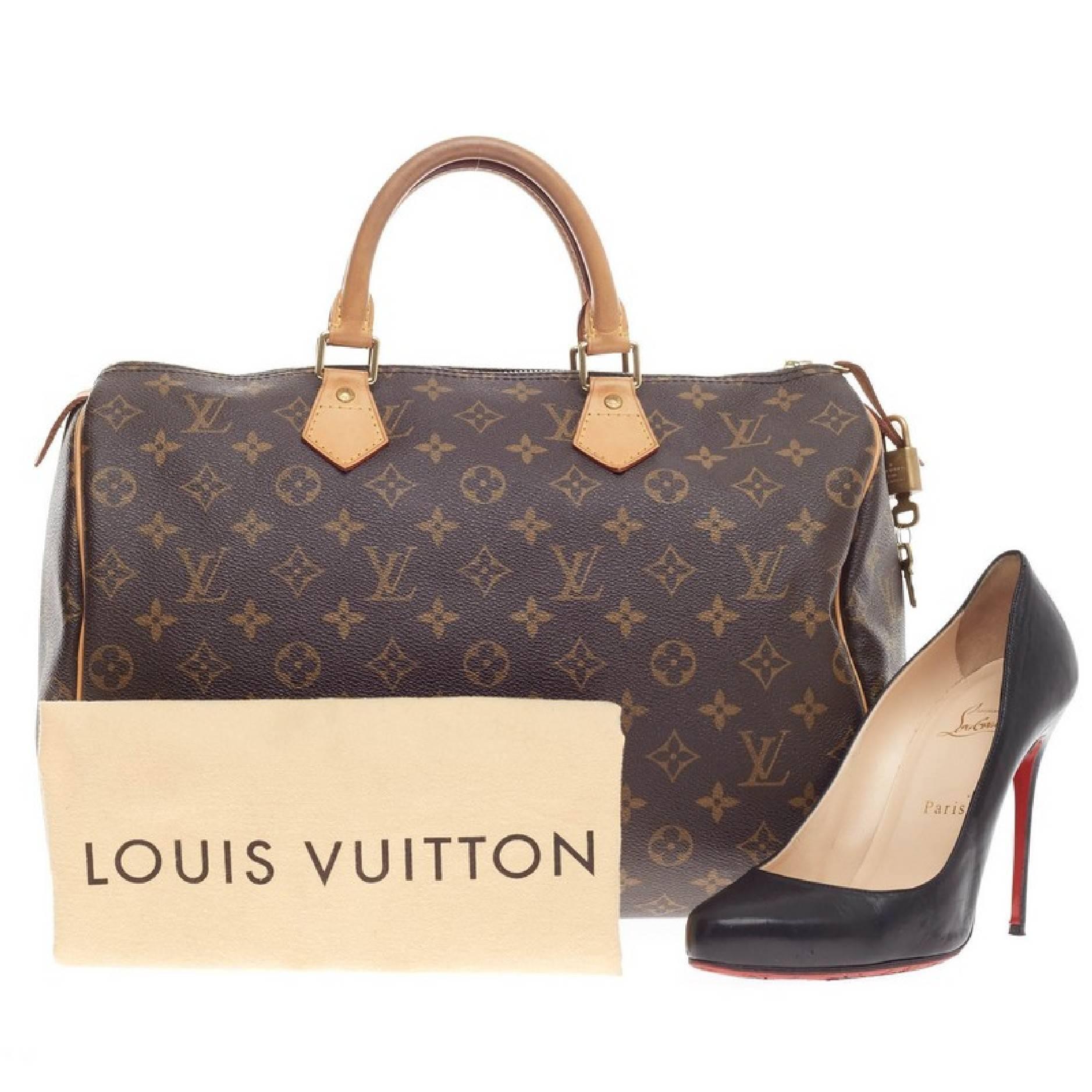This authentic Louis Vuitton Speedy Monogram Canvas 35 is a timeless favorite. The all-purpose Speedy is constructed with the brand's iconic LV monogram accented with brass tone hardware and cowhide leather trimmings. The roomy canvas interior