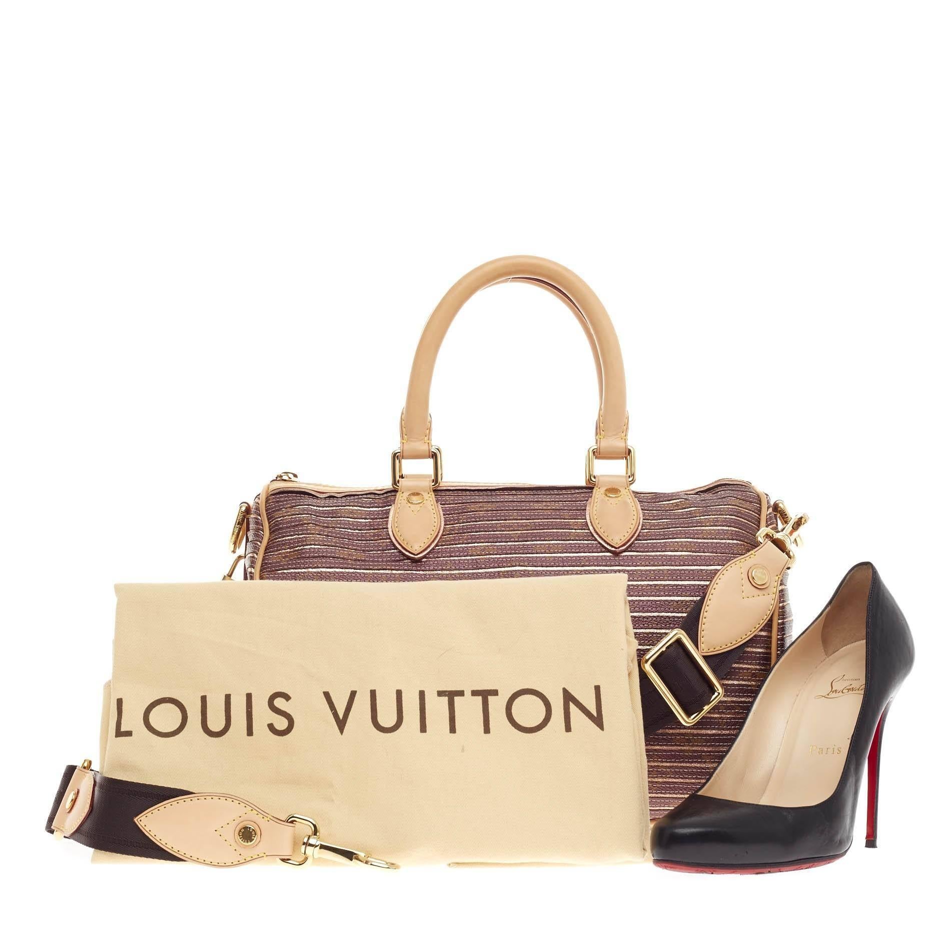 This authentic Louis Vuitton Speedy Bandouliere Limited Edition Monogram Eden 30 inspired by the iconic Speedy is reinvented in the brand's Spring/Summer 2010 collection. Crafted in classic monogram canvas with metallic peche leather stripes, this
