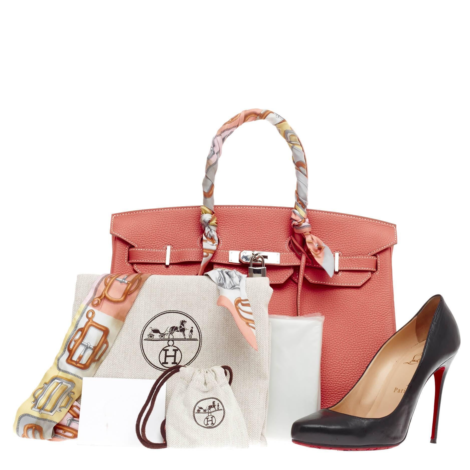 This authentic Hermes Birkin Crevette Clemence with Palladium Hardware 35 is the quintessential dream bag for the modern woman. Crafted in luxurious and scratch-resistant crevette pink clemence leather, this iconic tote features a matching leather