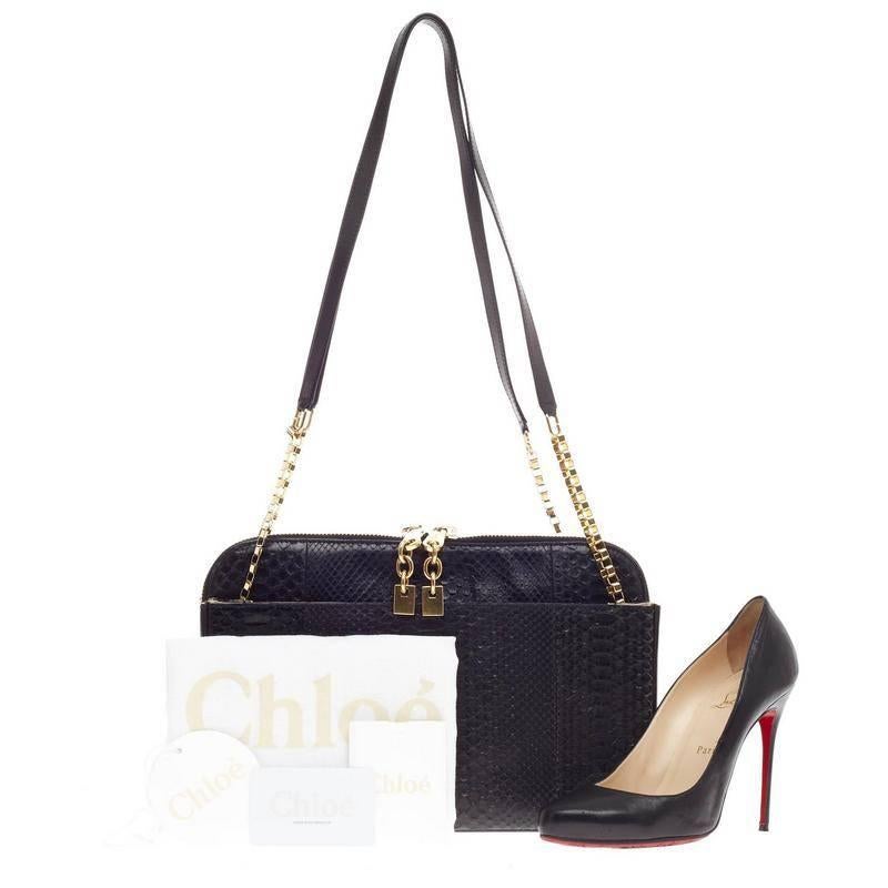 This authentic Chloe Lucy Shoulder Bag Python showcased in the brand's Fall/Winter 2012 Collection is the perfect sleek companion. Crafted in black genuine python skin, this minimalist, exotic chain flap features gold-tone hardware accents with