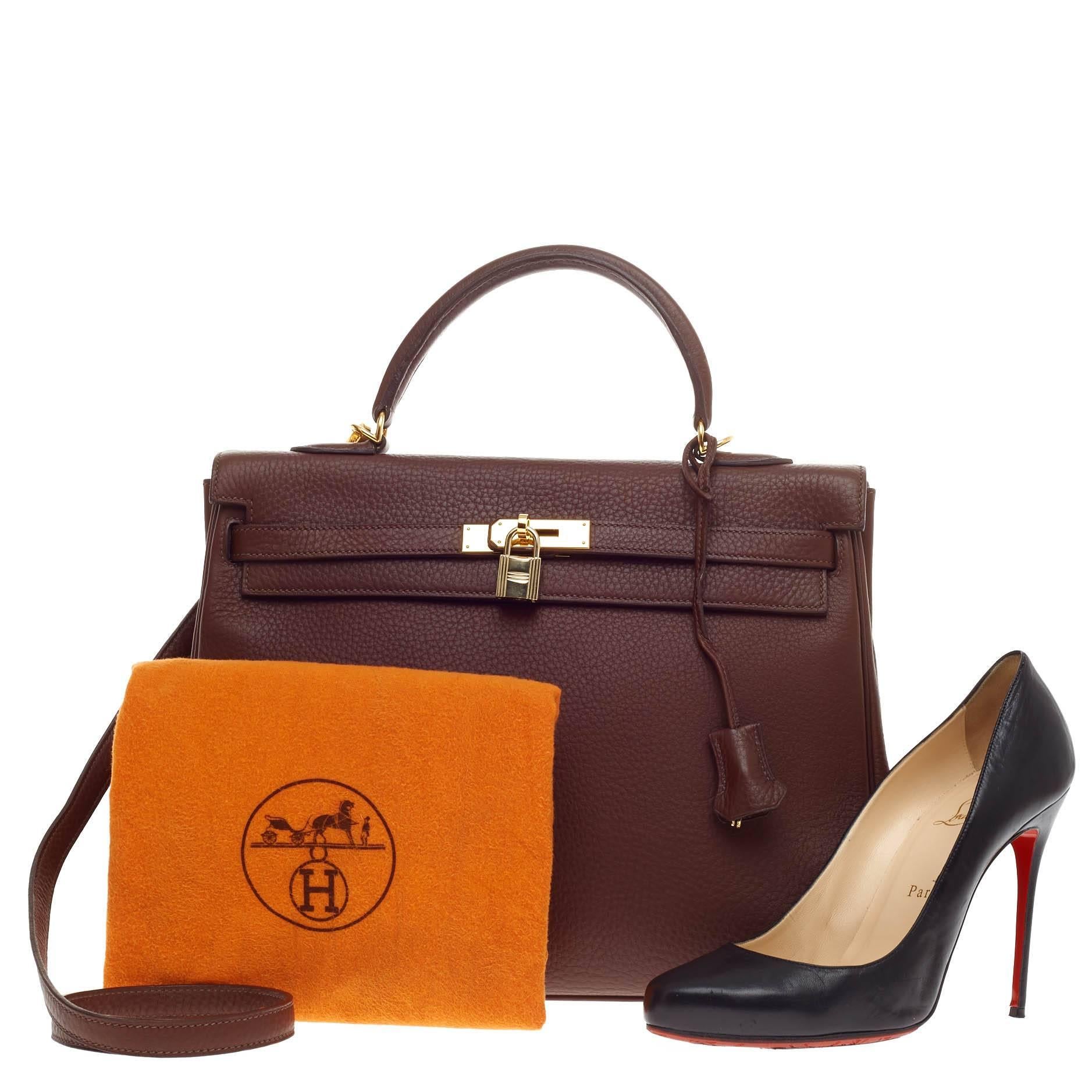 This authentic Hermes Kelly Chocolate Clemence with Gold Hardware 35 is as classic and timeless as they come. Designed in scratch-resistant, chocolate brown clemence leather and accented with polished gold hardware, this timeless satchel features a