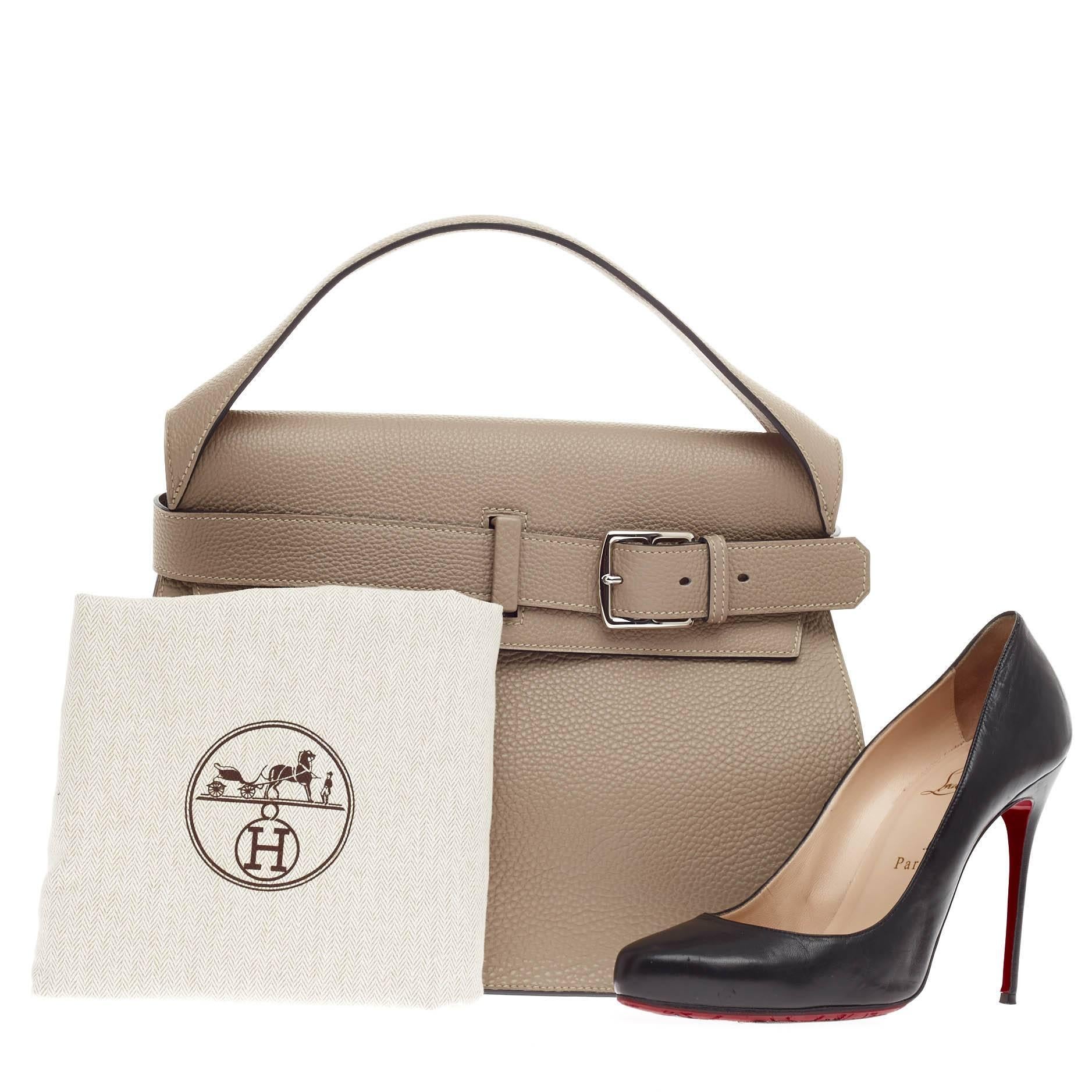 This authentic Hermes Etribelt Gris Tourterelle Togo debuting in its Spring/Summer 2012 Collection comes from its 