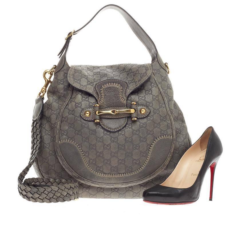 This authentic Gucci New Pelham Shoulder Bag Guccissima Leather Large is classic and sophisticated in design perfect for everyday use. Crafted in grey distressed guccissima leather, this shoulder bag features an adjustable wide leather shoulder